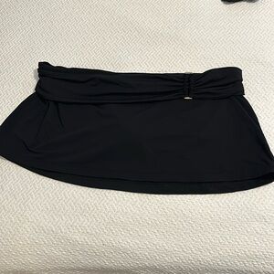 Swim skirt size large. Fold over waist, super flattering. Not bulky when wet
